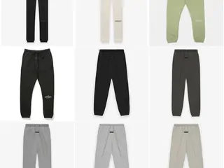 Sweatpants in black, cream, green and gray on white